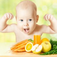 Baby fresh fruit meal and juice glass. Concept: healthy vitamin vegetable food diet make baby strong and happy