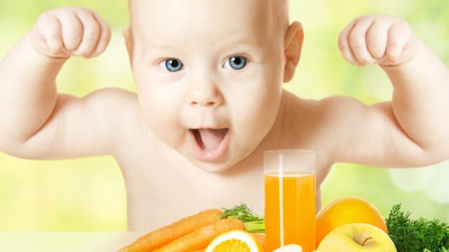 Baby fresh fruit meal and juice glass. Concept: healthy vitamin vegetable food diet make baby strong and happy